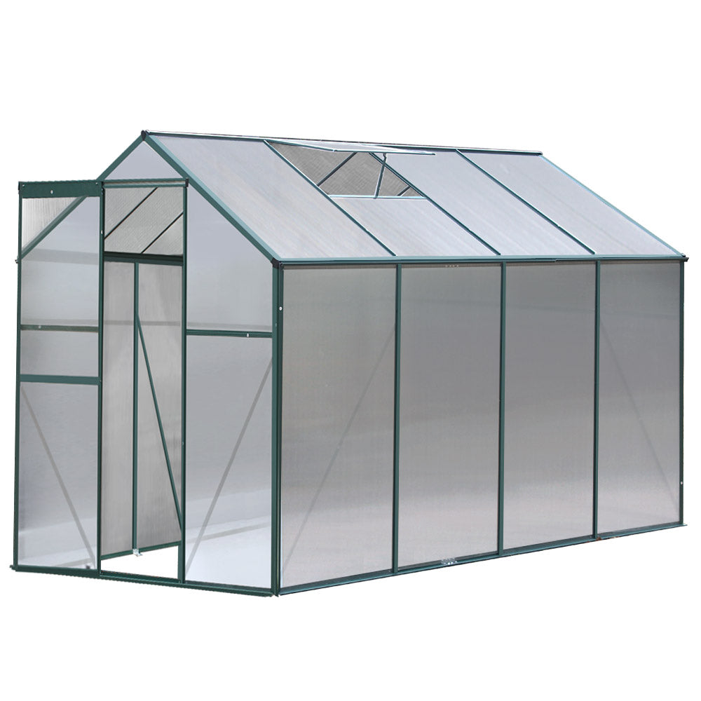 Another rendered view of a greenhouse, similar to the first but from a slightly different perspective, with clear panels and a green frame.