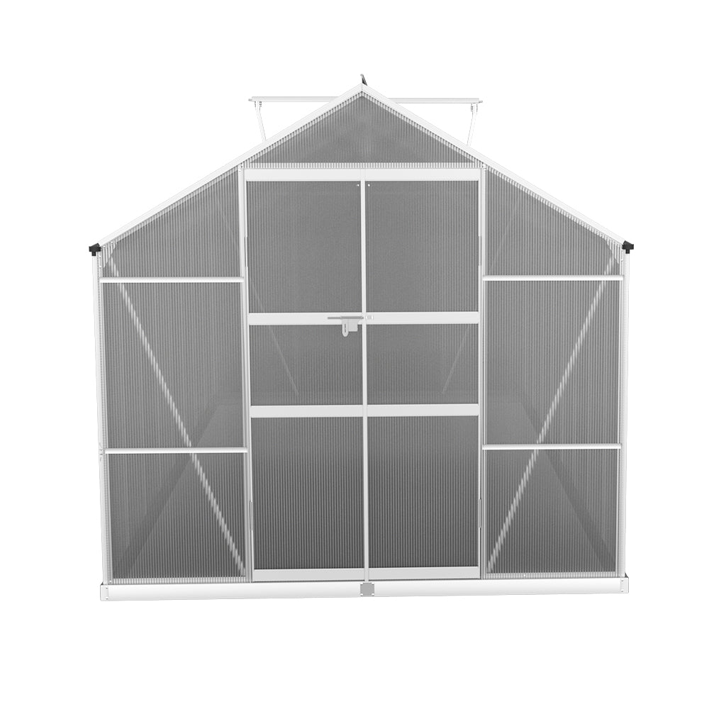 A front-facing view of the greenhouse, displaying the door and full-frame structure.