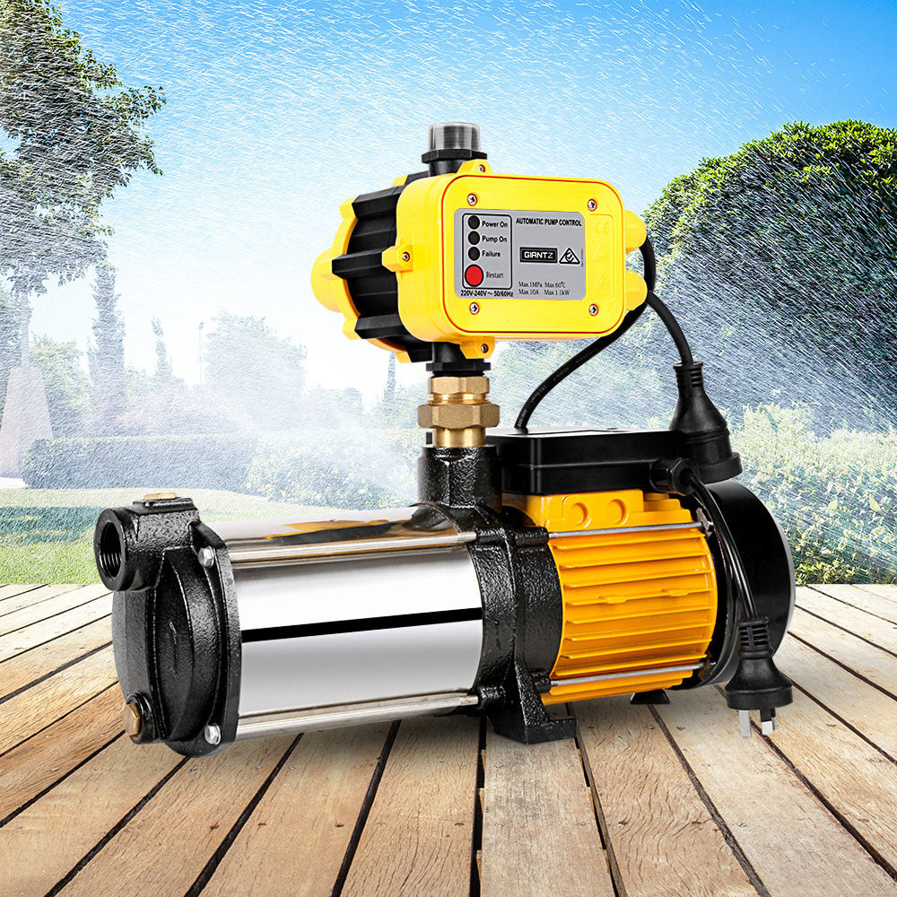 Water pump placed outdoors, ideal for garden irrigation or household water supply applications.