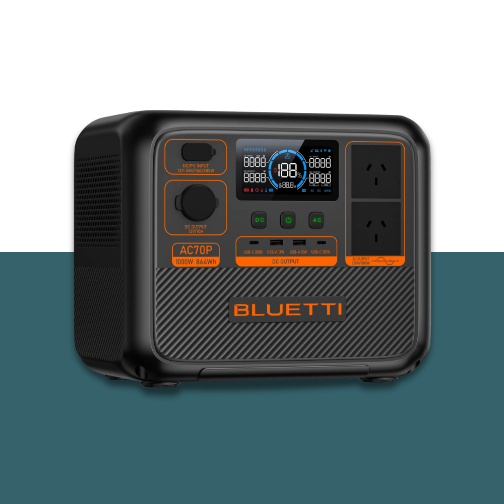 Right-angled view of Bluetti power station with side vents and controls, sitting on a clean two-tone background.