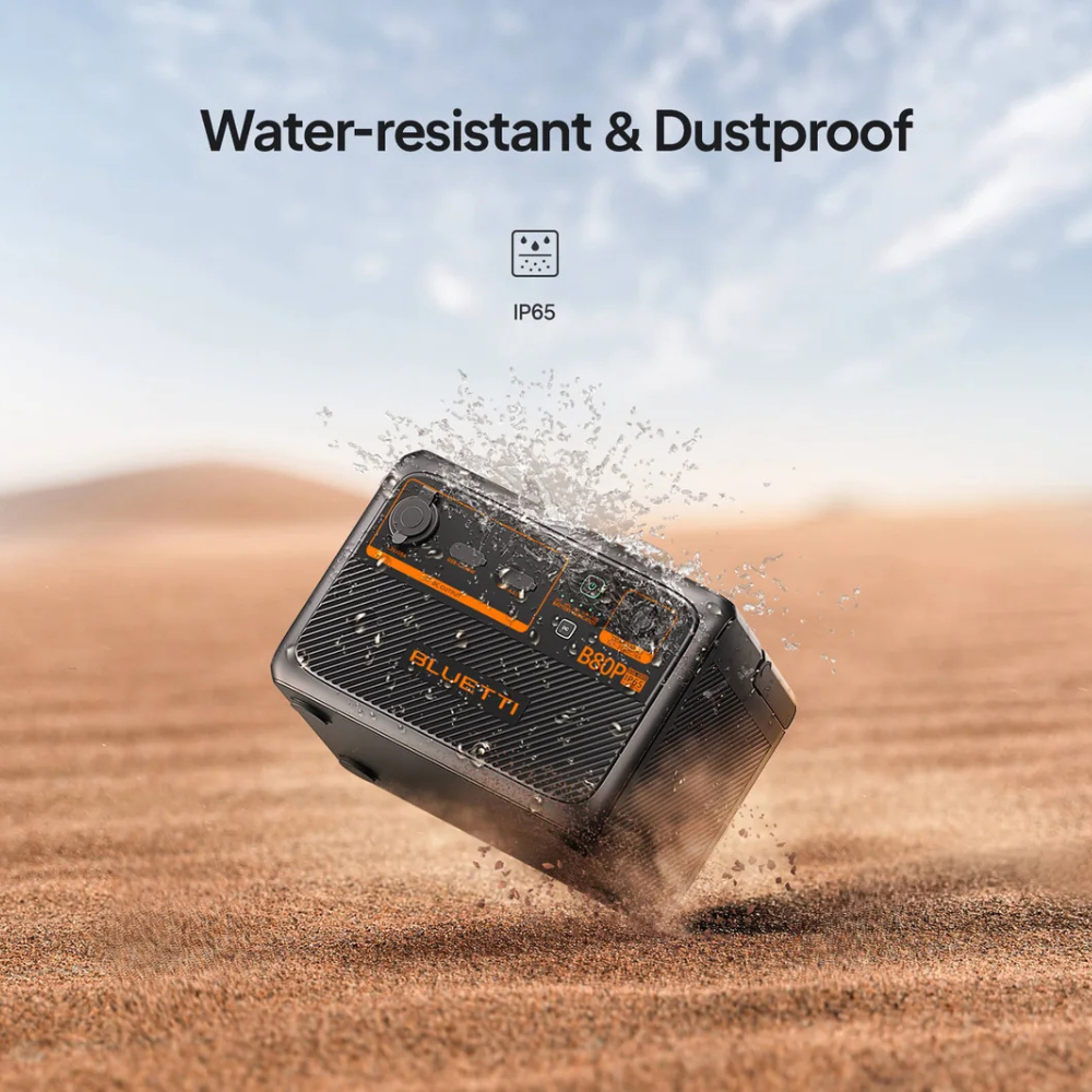 Bluetti power station mid-air kicking up dust, with label "Water-resistant & Dustproof", showing rugged design.