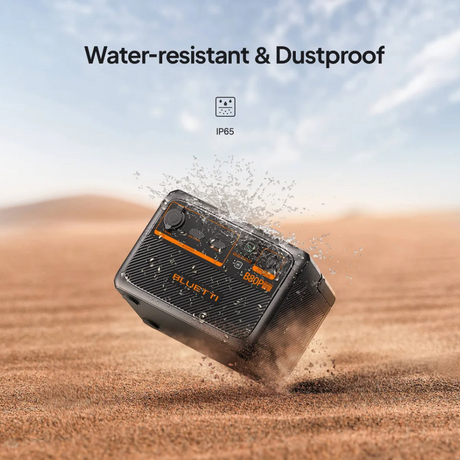 Bluetti power station mid-air kicking up dust, with label "Water-resistant & Dustproof", showing rugged design.