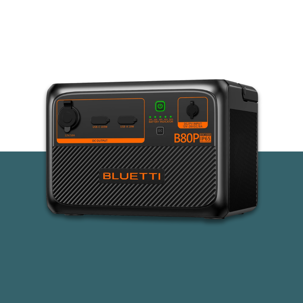 Angled right-side view of Bluetti unit with visible input/output ports and matte finish, on two-tone background.