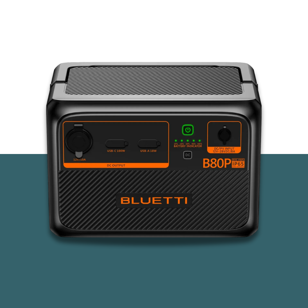 Front view of Bluetti BB90P showing AC and USB outlets, green LED indicator, and product label.