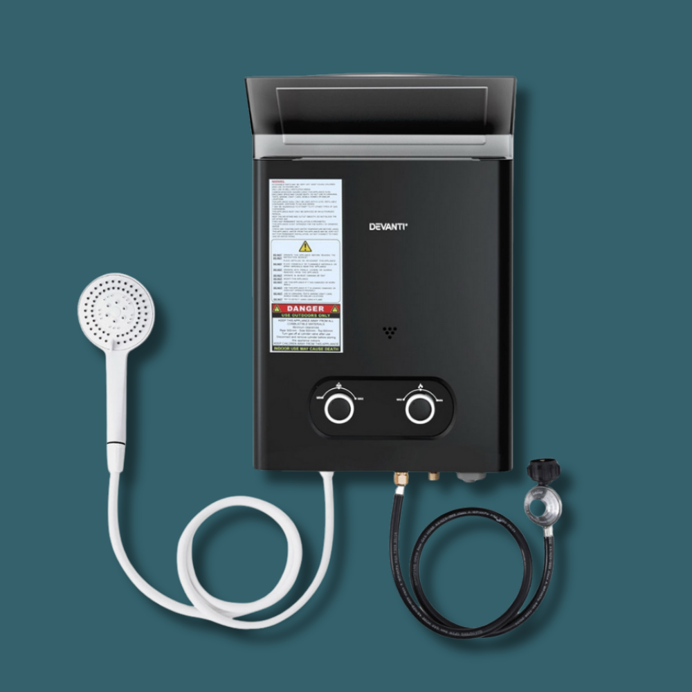 Black water heater with shower head and hoses on a teal background