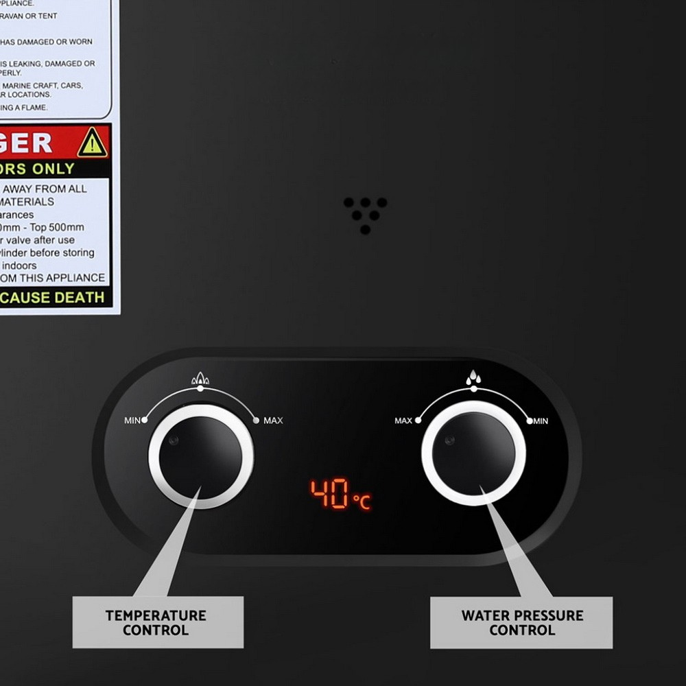 Control panel with temperature and water pressure controls on a black background