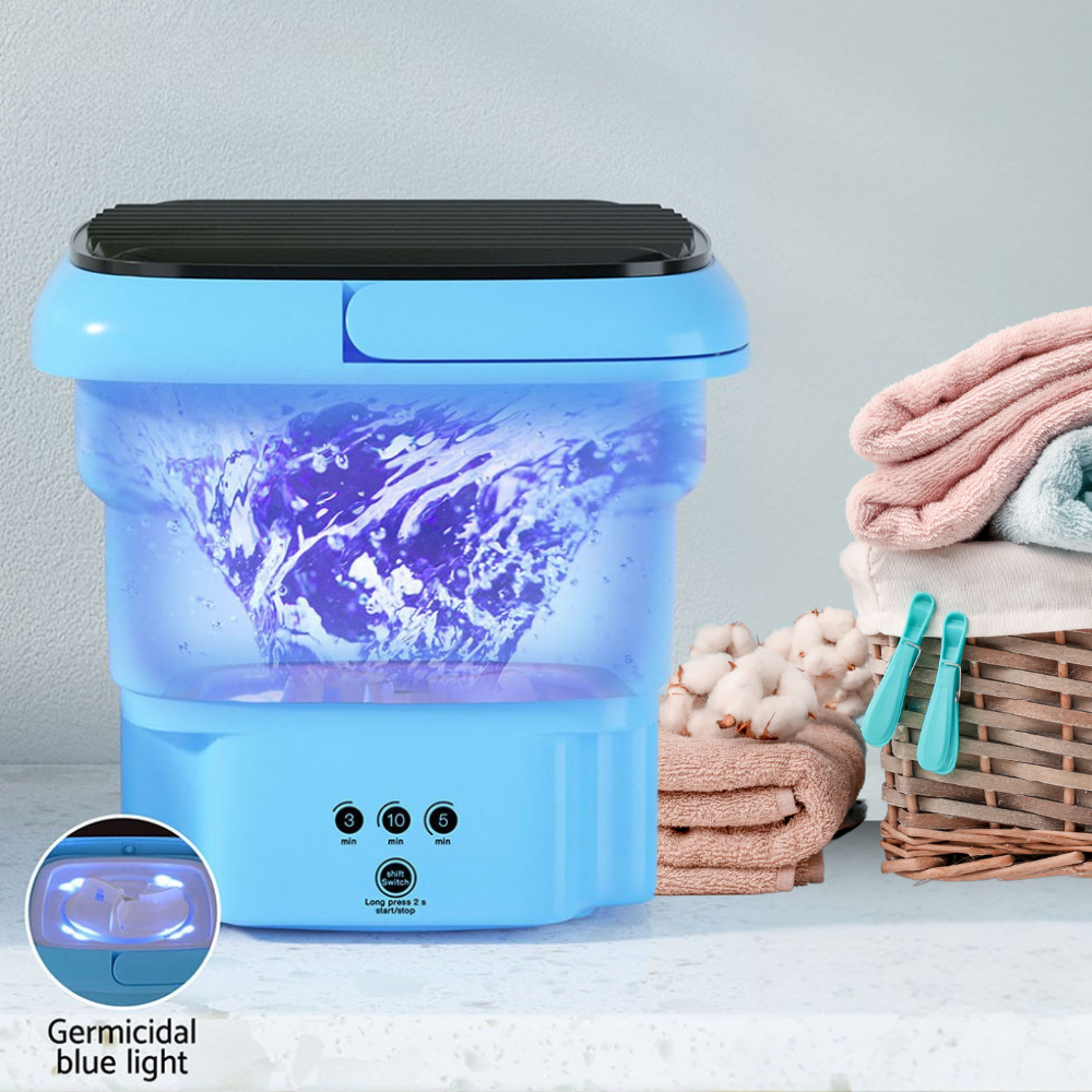 Mini washer in action with glowing water swirl, next to pink towels and a person using it.