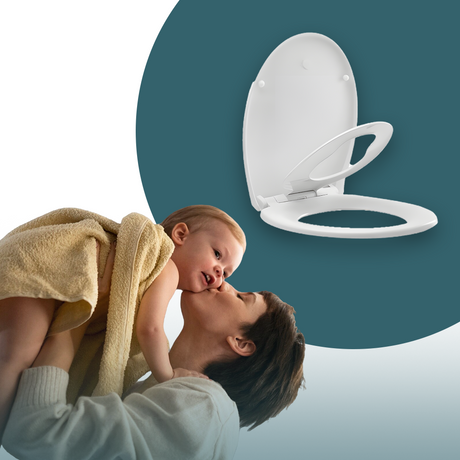 A mother holding her baby wrapped in a towel, with a white toilet seat featuring a built-in child seat shown above