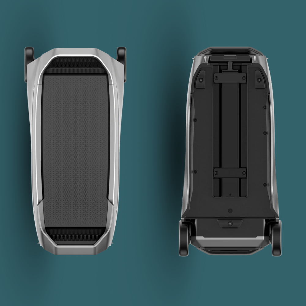 Top and bottom views of a black electronic device on a teal background