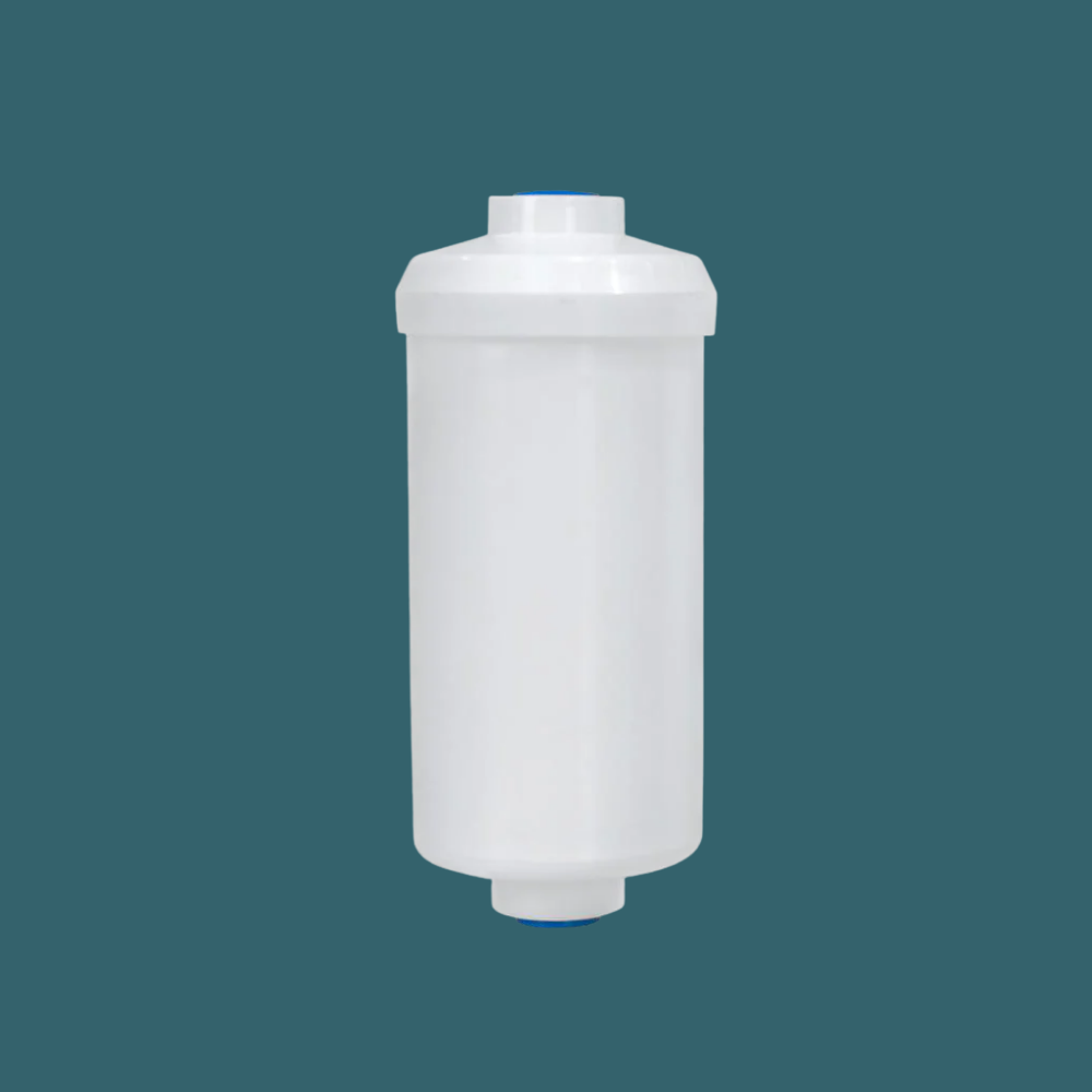 White cylindrical filter on a dark green background