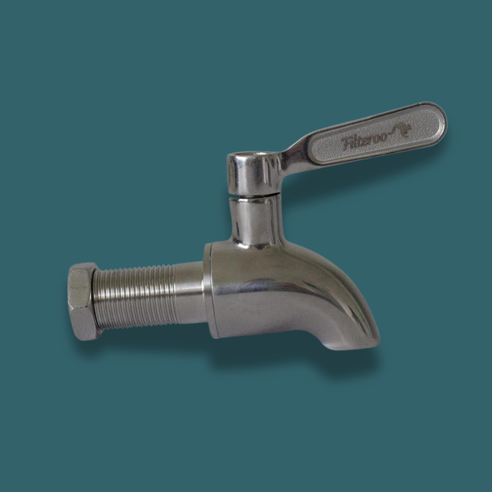Close-up of stainless steel tap/spigot with lever handle, designed for gravity-fed water filter units.