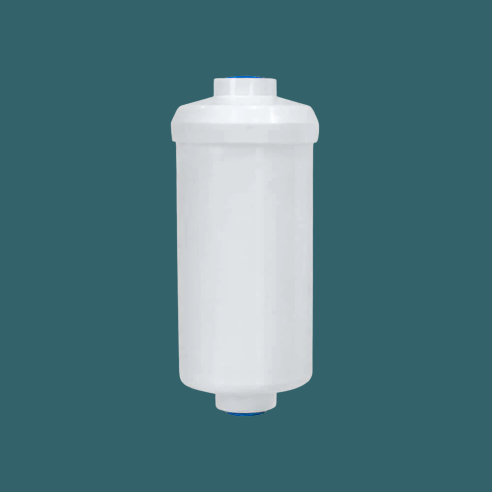 White ceramic-style replacement filter cartridge against a solid teal background.