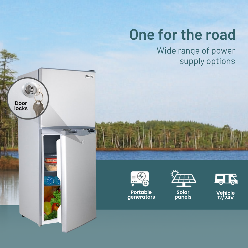 GECKO 125L 12V/24V Portable Upright Fridge Freezer with power supply options on a scenic background
