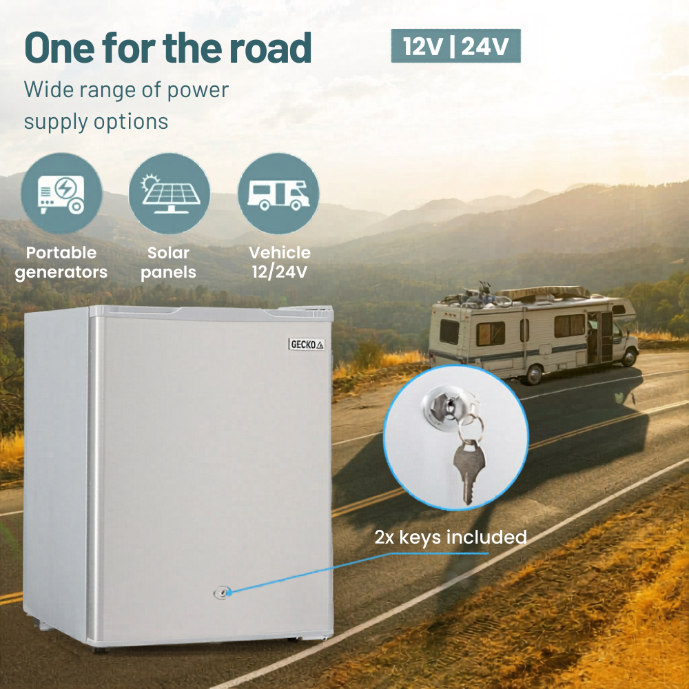 GECKO 70L 12V/24V Portable Upright Fridge Freezer with power supply options on a road trip background