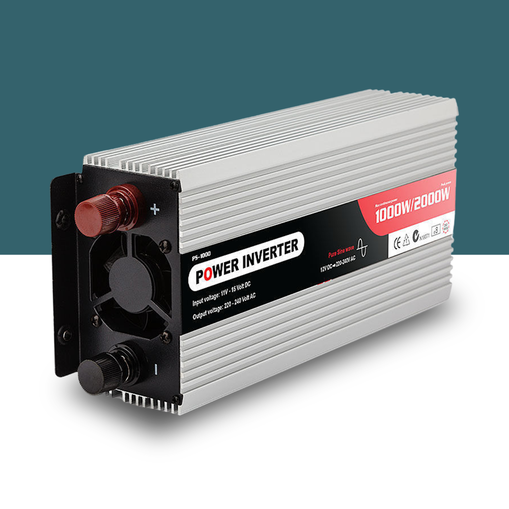 A side-angled view of the power inverter with its silver casing, red and black terminals, and labelled features