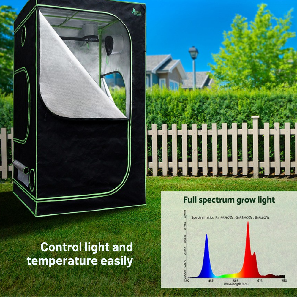Black grow tent with greenery and text about control light and temperature, outdoors.