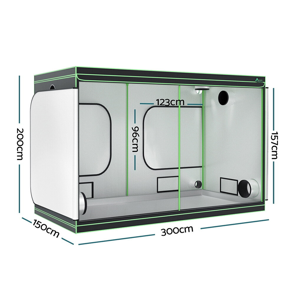 Large indoor hydroponics grow tent . The black exterior features green piping and multiple ventilation ports.