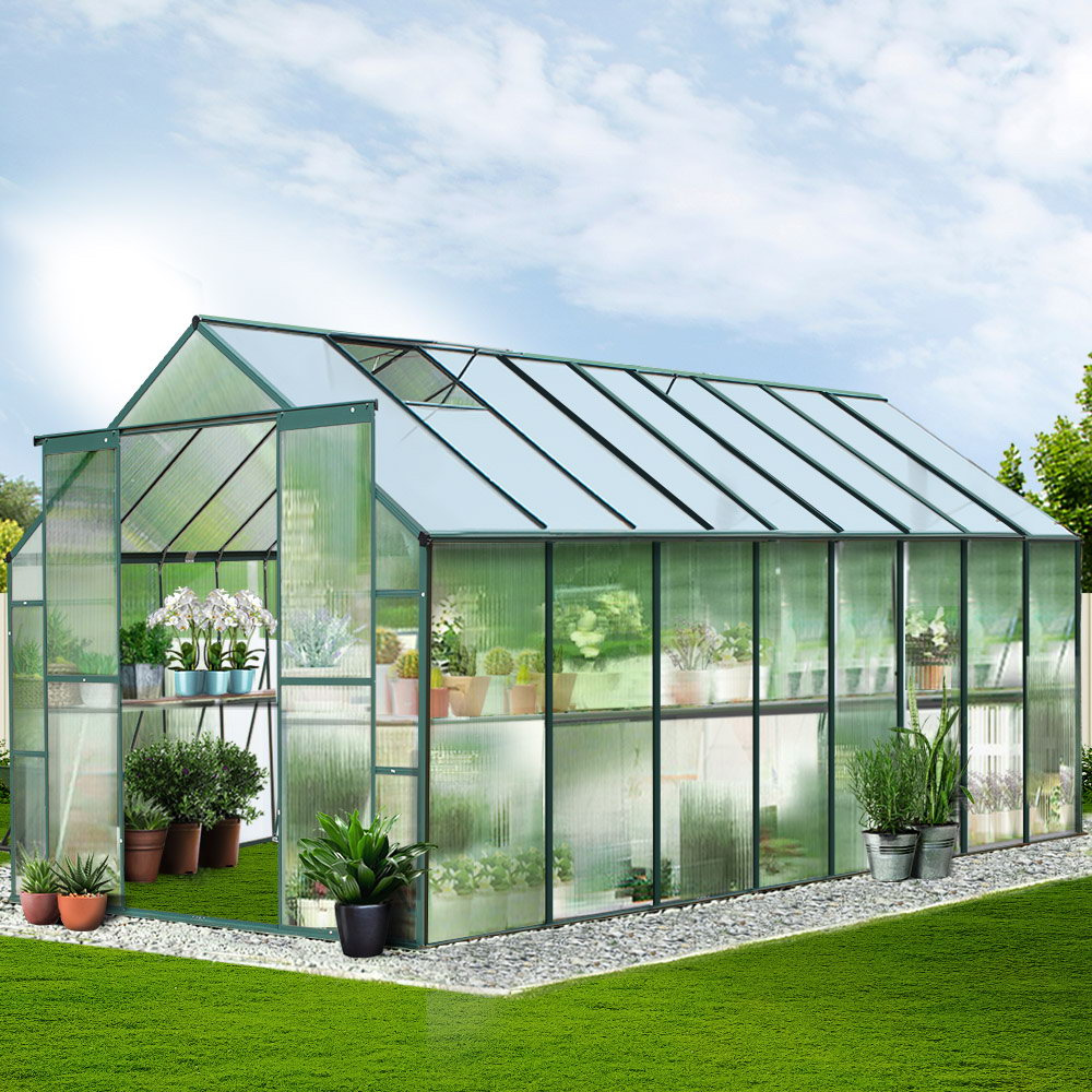 Greenhouse with plants on a sunny day