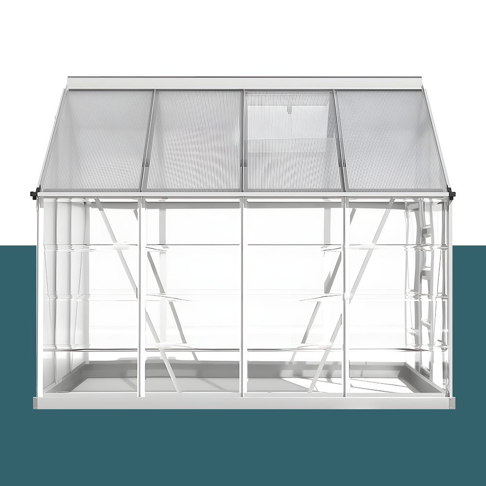 A side view of the aluminium polycarbonate greenhouse, showing the transparent roof panels and internal support structure, with the greenhouse placed against a white background