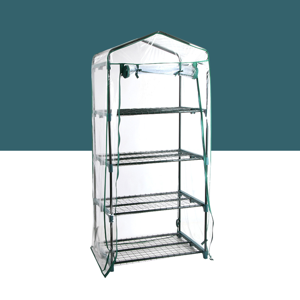 a standalone greenhouse structure with a transparent cover, featuring four tiers of shelving inside. It is labelled as "greenfingers-4-tier-1-6x0-7x0-5m-mini-greenhouse-garden-bed". The greenhouse has a sturdy metal frame and appears compact, suitable for small gardens or patios.