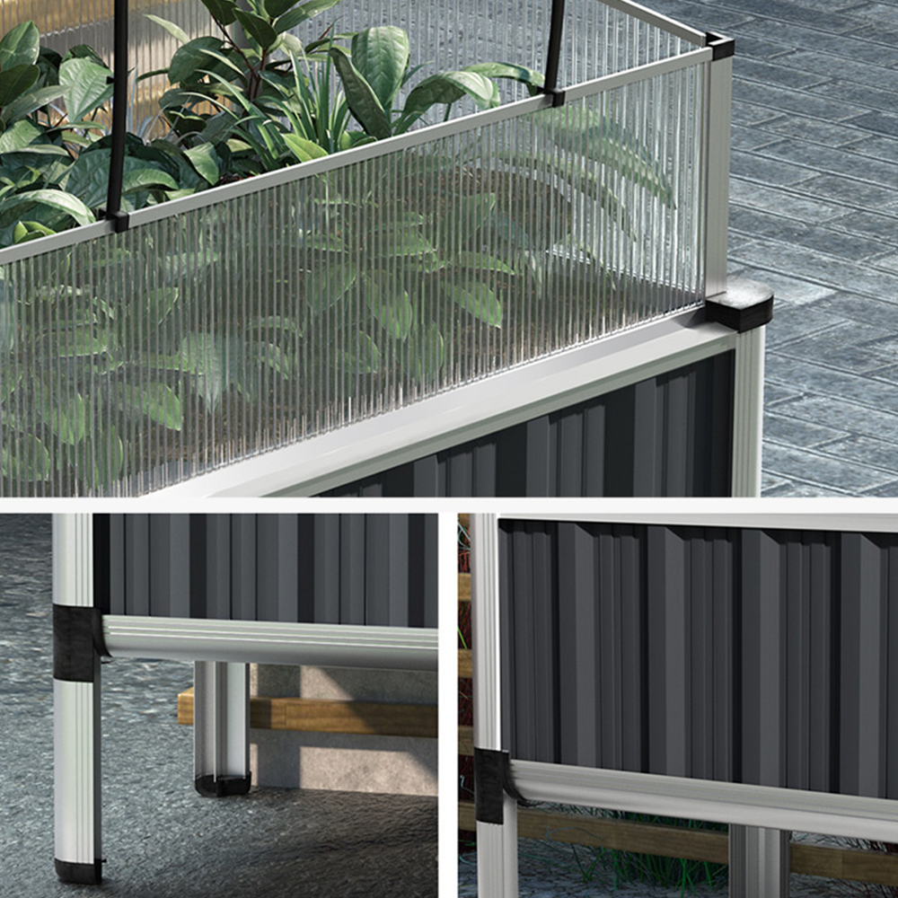 Side view of a raised garden bed with a slanted protective cover, set in a greenhouse with plants growing inside.