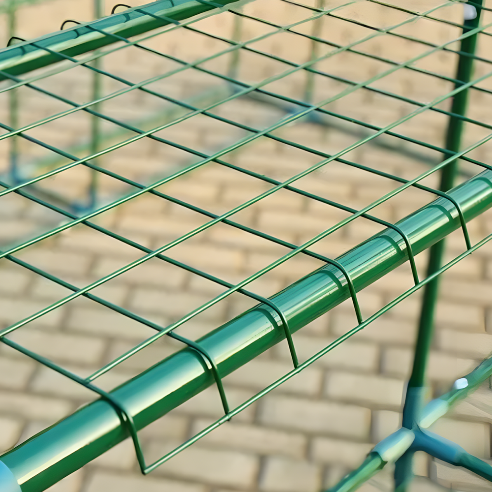 Detailed view of the metal shelf grid in the greenhouse, highlighting the durable green-painted metal frame