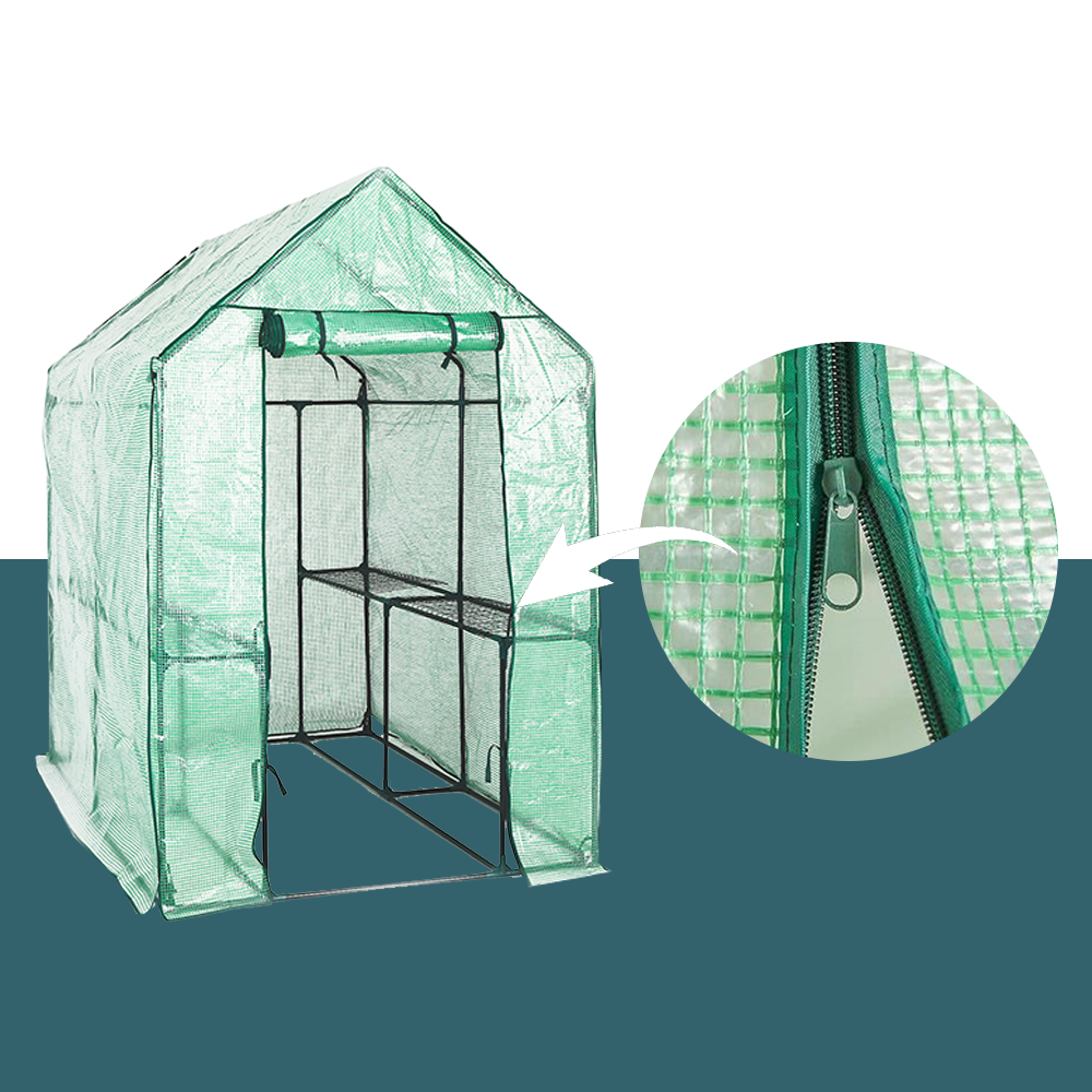 A full view of the green greenhouse with an inset circle that shows a close-up of the zippered front opening, illustrating the detailed zipper mechanism.