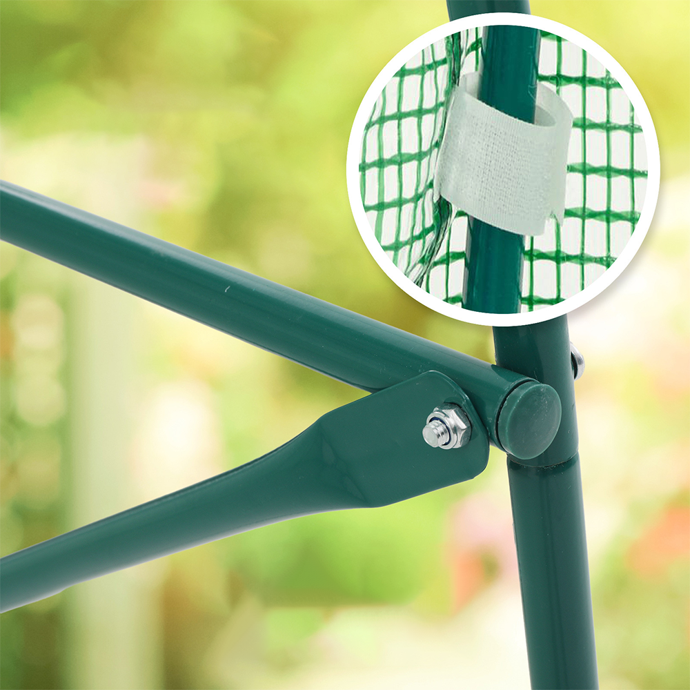 Close-up of the greenhouse’s frame, highlighting the sturdy metal structure with a protective green coating and Velcro straps for securing the cover