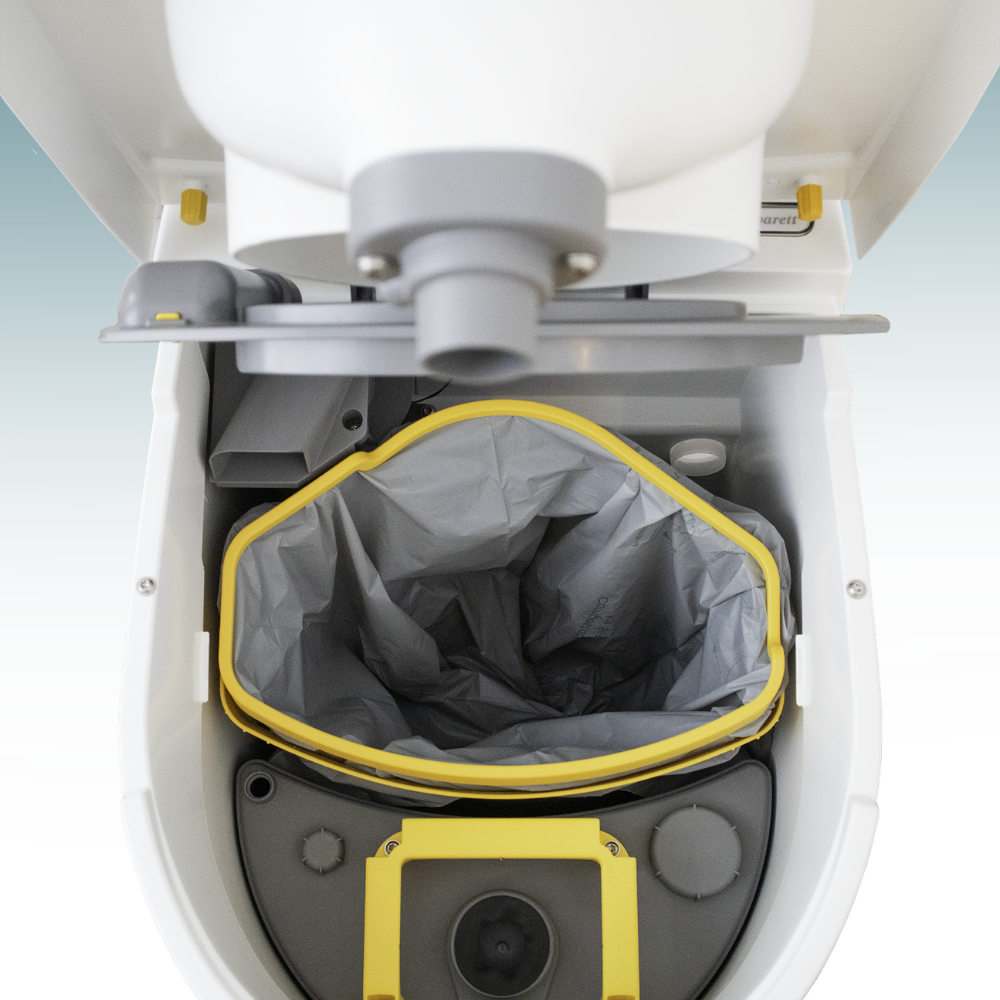 Close-up of a toilet with a gray bag inside the cistern.