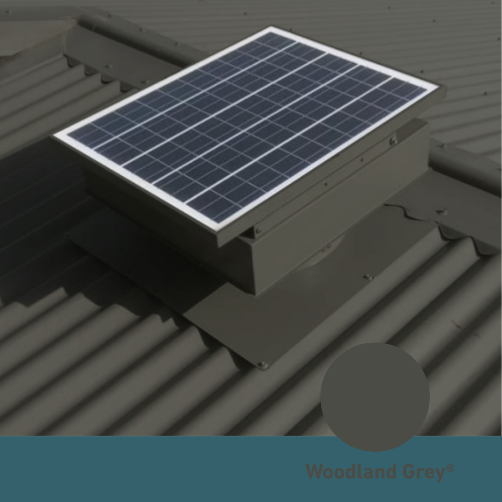 Square, solar-powered roof ventilator unit in Woodland Grey installed on a corrugated metal roof.
