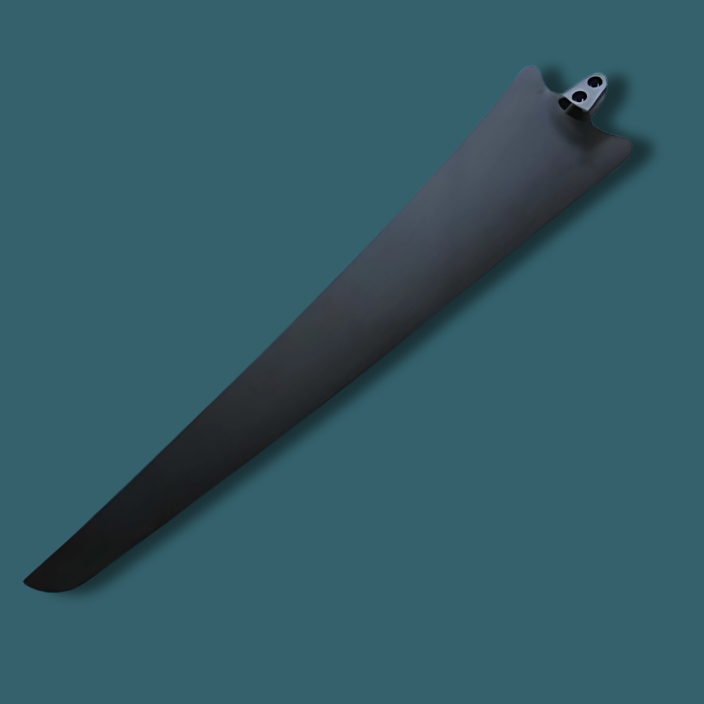Single wind turbine blade laid flat on a teal background.