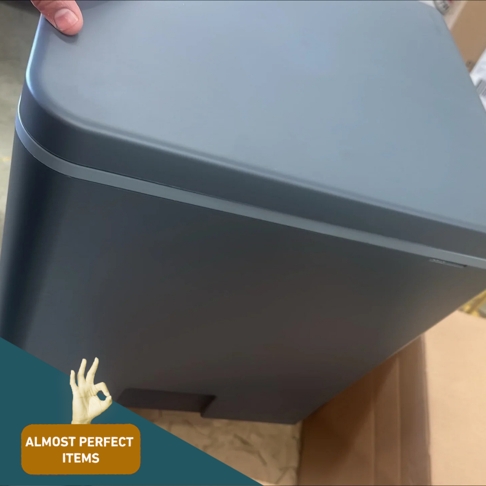 Top-side angled view (lid misalignment):
Angled view of the toilet showing slight misalignment at the lid seam, qualifying as an "Almost Perfect" item.