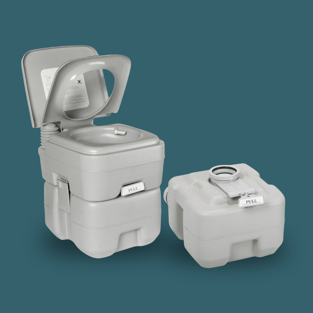 Lid open with tanks separated, displaying the detachable top and bottom sections of the toilet.