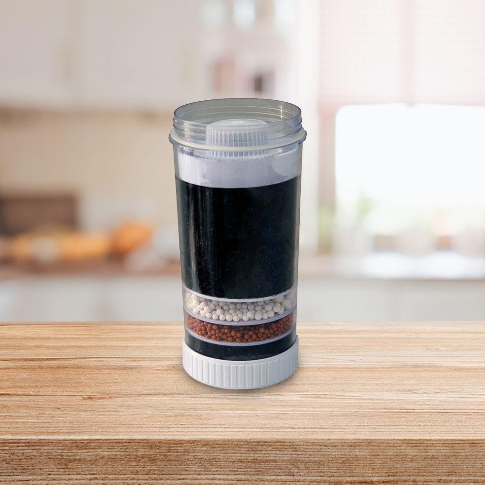 "Replacement water filter cartridge displayed on a wooden countertop."