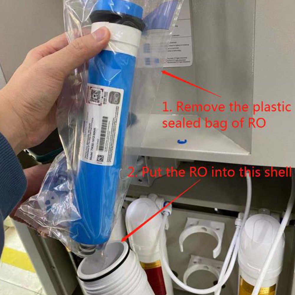 A person holding a sealed blue RO membrane while installing it inside an air-to-water generator, with red instructional text guiding the installation process.