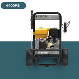  A MaxWatt 4400 PSI pressure washer with its components, including the powerful engine and reinforced frame, clearly visible.