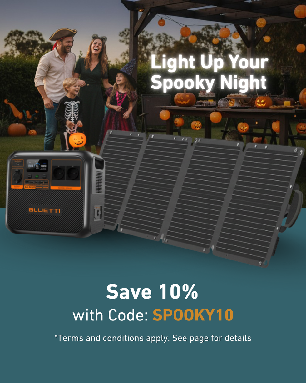 Family celebrating Halloween with outdoor decorations and a Bluetooth speaker, featuring a promotional message for a discount code.
