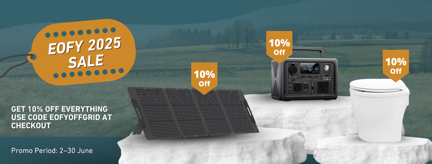 EOFY 2025 Sale banner with orange sale tag and text promoting 10% off everything using code 'EOFYOFFGRID'. Featured products include a foldable solar panel, a Bluetti portable power station, and a composting toilet, each with a '10% Off' badge. Background shows a scenic outdoor landscape. Promo period: 2–30 June.