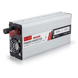  A full view of the power inverter, showcasing its silver casing, red and black terminals, and compact design.