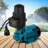 Water pump in a garden setting, ready for irrigation or household water supply needs