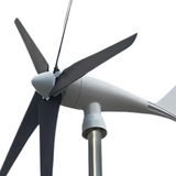 Close-up of the wind turbine’s central hub and blades, showing construction details.