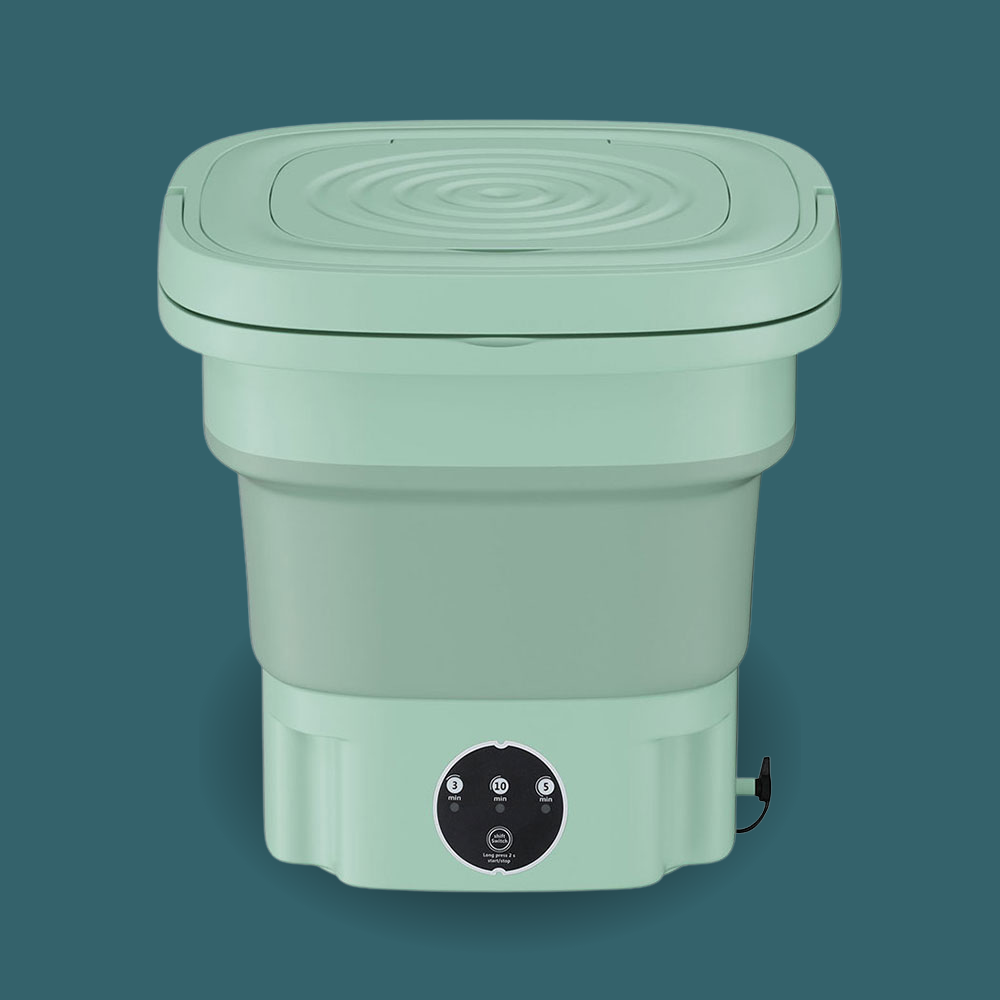 Green collapsible washing machine on a teal background