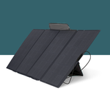 Foldable solar panel on a white surface with a teal background