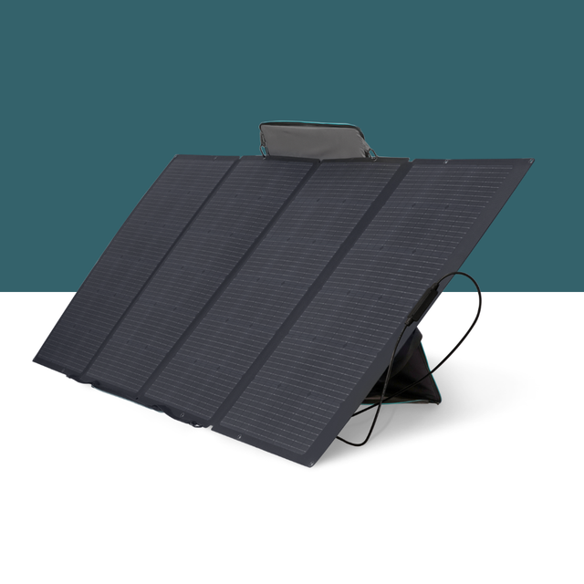 Foldable solar panel on a white surface with a teal background