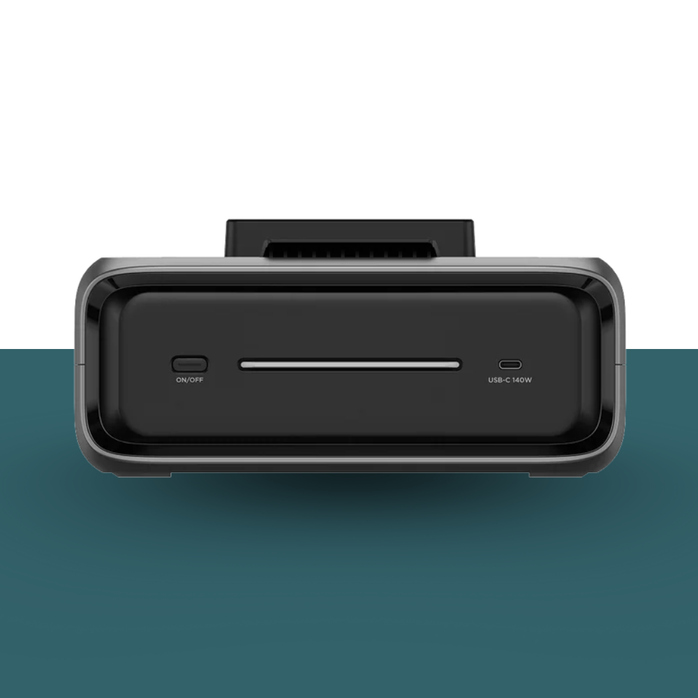Black electronic device with ports on a gradient background