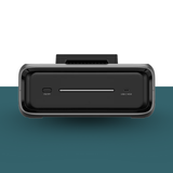 Black electronic device with ports on a gradient background