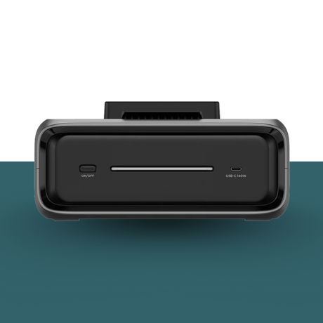 Black electronic device with ports on a gradient background