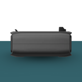 Black rectangular object on a green and white background