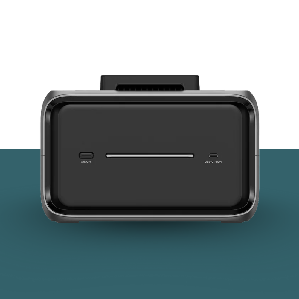 Black electronic device with ports on a gradient background