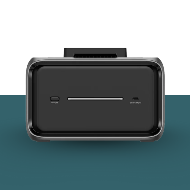 Black electronic device with ports on a gradient background